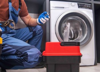 professional-worker-installing-washing-machine-2022-12-16-11-45-47-utc-2048x1365.jpg